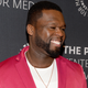 Illustration for article titled 50 Cent seems increasingly tickled by a street artists goofy meme murals of his face